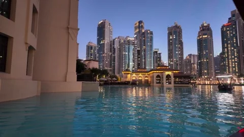 Dubai, UAE - 23 June 2026: Downtown skyline with Burj Khalifa and UAE flag Stock Footage 337500515