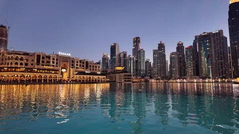 Dubai, UAE - 23 June 2026: Downtown skyline with Burj Khalifa and UAE flag Stock Footage 337501405