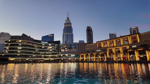 Dubai, UAE - 23 June 2026: Downtown skyline with Burj Khalifa and UAE flag Stock Footage 337504732
