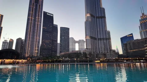Dubai, UAE - 23 June 2026: Downtown skyline with Burj Khalifa and UAE flag Stock Footage 337504888