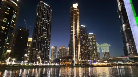 Dubai, UAE - 23 June 2026: Downtown skyline with Burj Khalifa and UAE flag Stock Footage 337505396