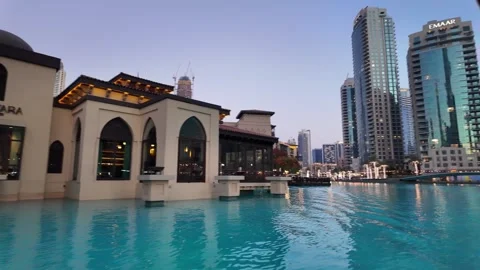 Dubai, UAE - 23 June 2026: Downtown skyline with Burj Khalifa and UAE flag Stock Footage 337505616