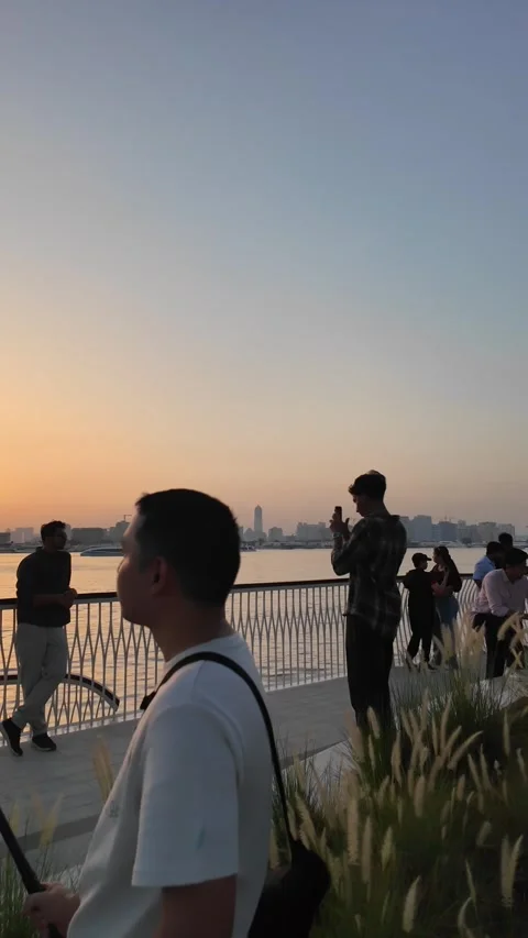 Dubai, UAE - 24 June 2026: Sunset and evening atmosphere at Dubai Creek wat.. Stock Footage 337548279