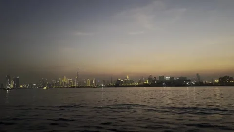 Dubai UAE 29 May 2026 Burj Khalifa skyline view from boat Stock Footage 335864410