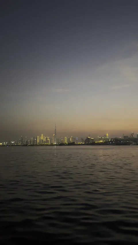 Dubai UAE 29 May 2026 Burj Khalifa skyline view from boat Stock Footage 335864462