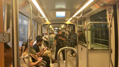 DUBAI, UAE - APRIL 14, 2026: Cinematic view of Dubai Metro and busy urban t.. Stock Footage 332696132