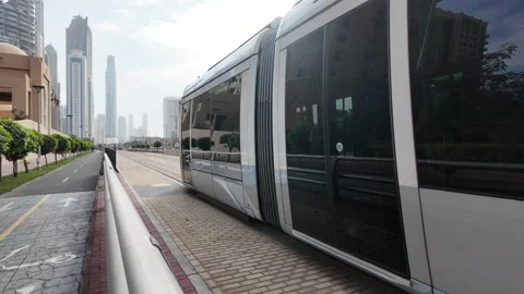 DUBAI, UAE - APRIL 15, 2026: Commuters and tourists using the Dubai Metro a.. Stock Footage 332770838