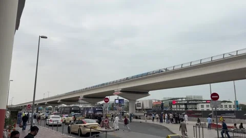 DUBAI, UAE - APRIL 15, 2026: Commuters and tourists using the Dubai Metro a.. Stock Footage 332771032