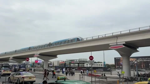 DUBAI, UAE - APRIL 15, 2026: Commuters and tourists using the Dubai Metro a.. Stock Footage 332771067