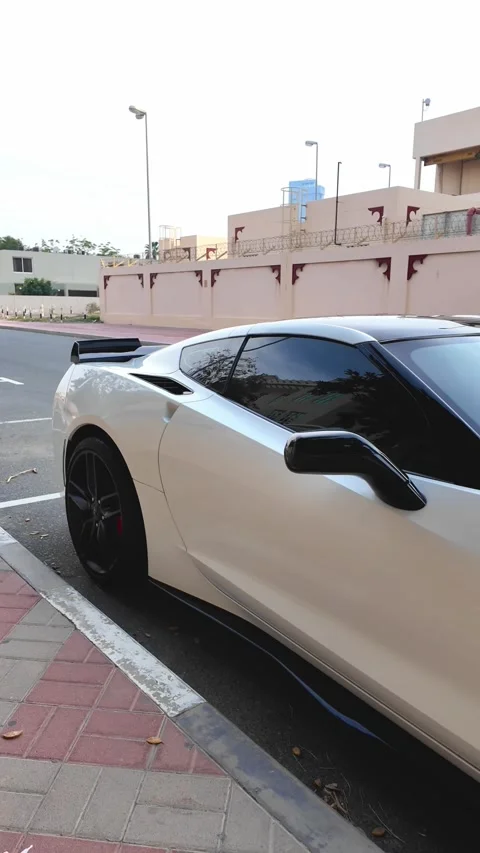 DUBAI, UAE - APRIL 16, 2026: Luxury supercars and high-end SUVs driving on .. Stock Footage 332835539