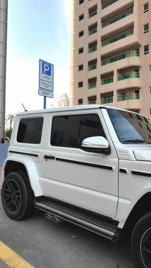 DUBAI, UAE - APRIL 16, 2026: Luxury supercars and high-end SUVs driving on .. Stock Footage 332835547