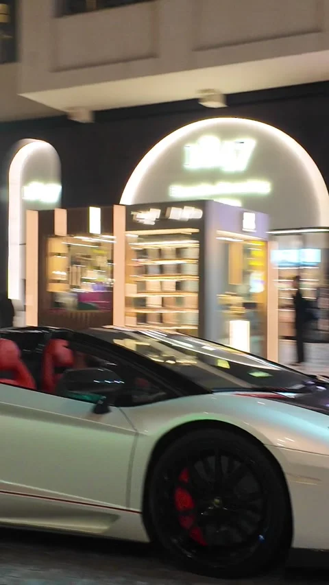DUBAI, UAE - APRIL 16, 2026: A diverse collection of luxury supercars, prem.. Stock Footage 332840197