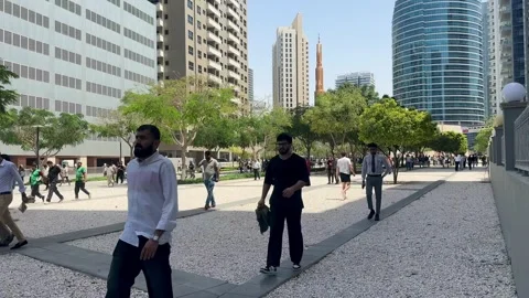DUBAI, UAE - APRIL 18, 2026: Muslim worshippers after Friday Jumu'ah prayer. Stock Footage 332998204