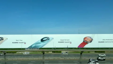 DUBAI, UAE - APRIL 18, 2026: Dubai Metro Views, Burj Al Arab, and City Landmarks Stock Footage 332998381