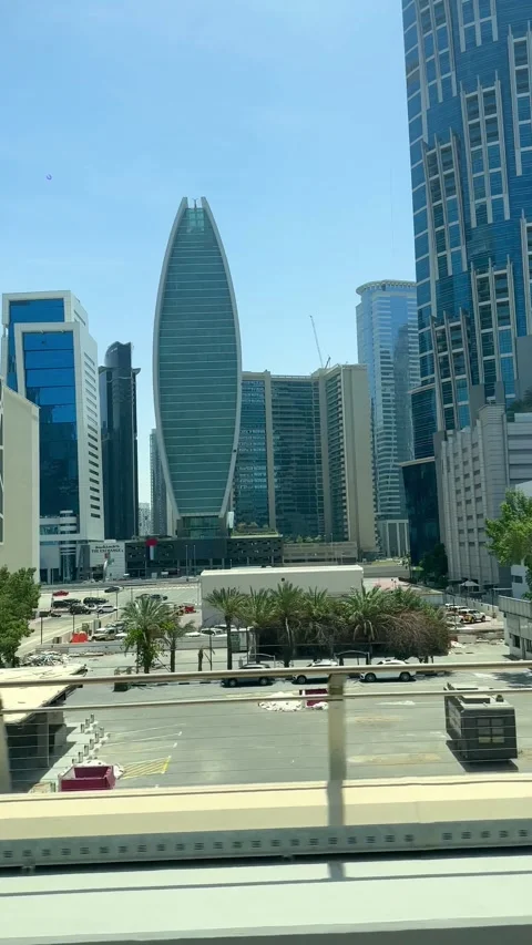 DUBAI, UAE - APRIL 18, 2026: Dubai Metro Views, Burj Al Arab, and City Landmarks Stock Footage 332998481