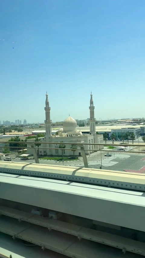 DUBAI, UAE - APRIL 18, 2026: Dubai Metro Views, Burj Al Arab, and City Landmarks Stock Footage 332998490