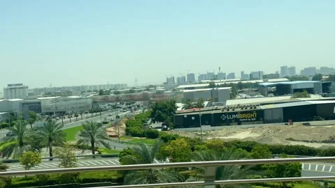 DUBAI, UAE - APRIL 18, 2026: Dubai Metro Views, Burj Al Arab, and City Landmarks Stock Footage 332998499