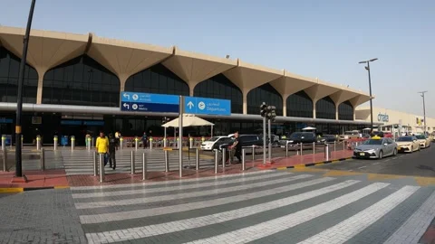 Dubai, UAE - August 23, 2024 - exterior view of Terminal 1 at DXB Stock Footage 293363616