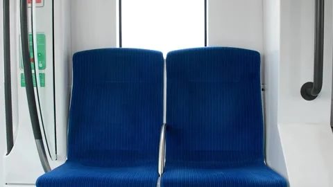 Dubai, UAE - July 12, 2024: Blue chairs of Dubai metro train. Video stock 280464152