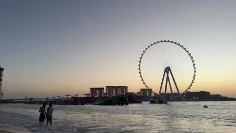 Dubai UAE July 7 2026 JBR beach and Dubai Marina evening cityscape with Ain.. Vídeo Stock 338381374