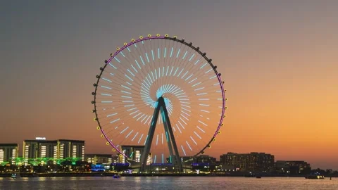 Dubai UAE July 7 2026 JBR beach sunset and camel ride at Dubai Marina Stock Footage 338388644