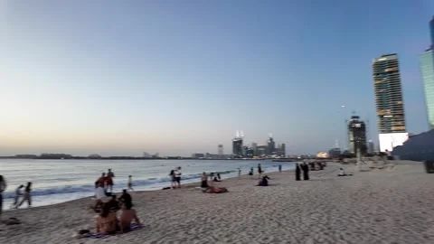 Dubai, UAE - June 02, 2026: Tourists and locals enjoying a sunset walk at J.. Stock Footage 336175040