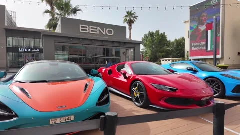 Dubai, UAE - June 02, 2026: Row of luxury supercars including Lamborghini, .. Stock Footage 336183195