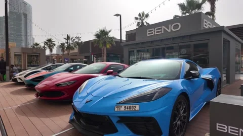 Dubai, UAE - June 02, 2026: Row of luxury supercars including Lamborghini, .. Stock Footage 336183244