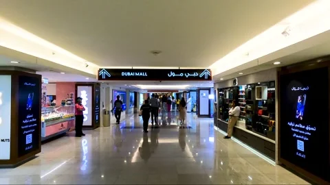 Dubai, UAE - June 04, 2024: Visitors walking in the corridor to Dubai Mall. Stock Footage 279878869