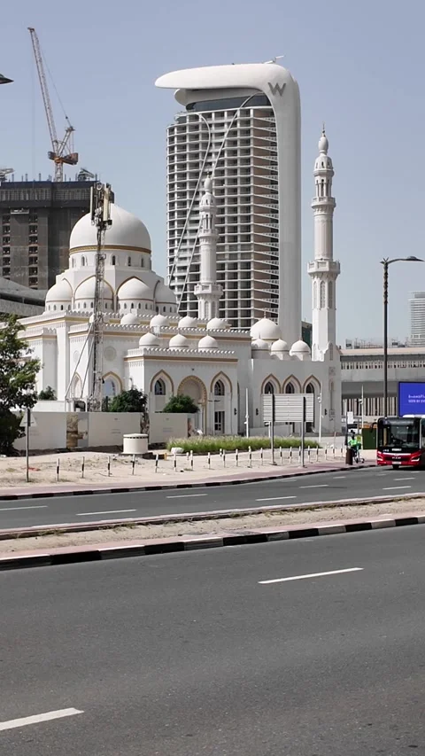 Dubai, UAE - June 11, 2026: Mosque and urban construction. Stock Footage 336717814