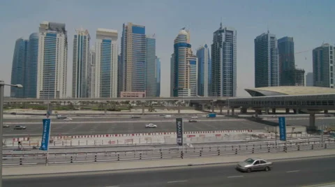 DUBAI, UAE - JUNE 13: View of modern skyscrapers in Dubai Marina 스톡 동영상 59601806