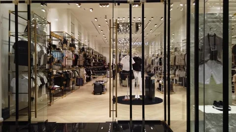 Dubai, UAE, June-16, 2025:  Long glass display window of a boutique in a Duba Video stock 312824973