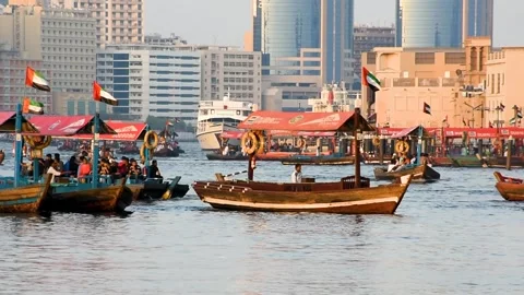 Dubai, UAE - June 17, 2024: Traditional wooden boats in the Bur Dubai area. Video stock 279878162