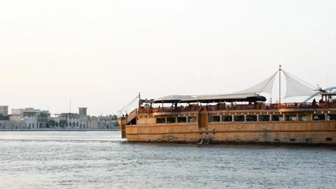Dubai, UAE - June 17, 2024: Tourists on a wooden ship in Dubai. Stock Footage 279878173