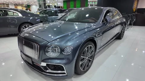 Dubai UAE June 17 2026 Luxury car at automotive showroom Stock Footage 337124044