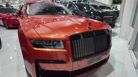 Dubai UAE June 17 2026 Luxury car at automotive showroom Stock Footage 337124087