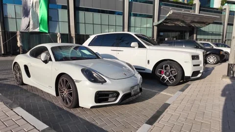 Dubai UAE June 17 2026 Luxury car at automotive showroom Stock Footage 337124344