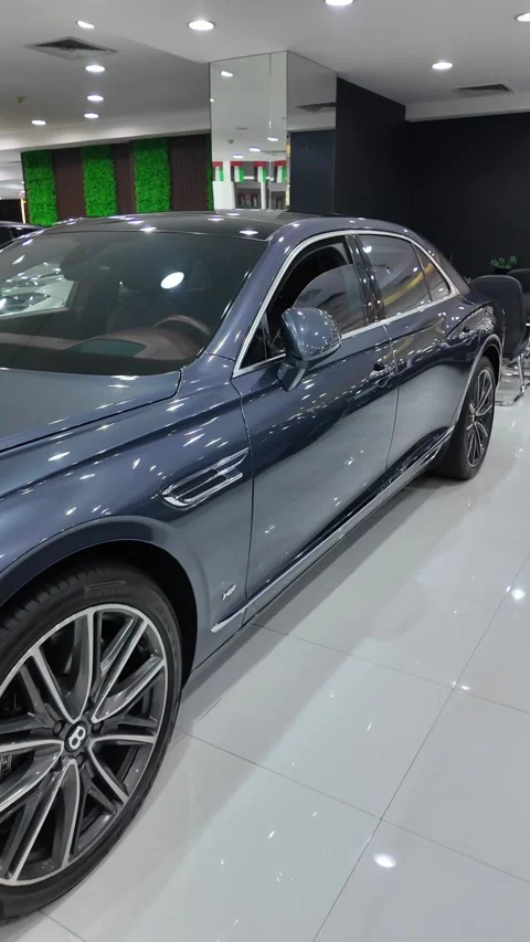 Dubai UAE June 17 2026 Luxury car at automotive showroom Stock Footage 337128283