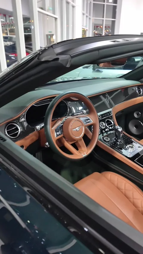 Dubai UAE June 17 2026 Luxury car at automotive showroom Stock Footage 337128330