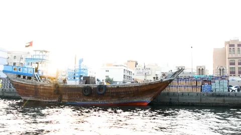 Dubai, UAE - May 06, 2024: A wooden cargo ship moored at the pier in Dubai. Stock Footage 279878321