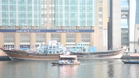 Dubai, UAE - May 09, 2024: Tourists on a traditional wooden boat in Dubai. Video stock 279878718