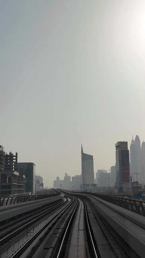 DUBAI, UAE - MAY 12, 2026: POV front view from a moving Dubai Metro train o.. Stock Footage 334715225