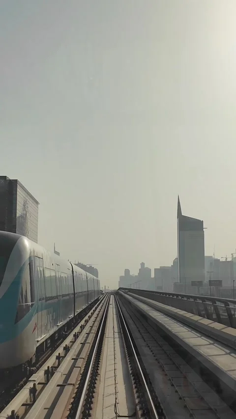 DUBAI, UAE - MAY 12, 2026: POV front view from a moving Dubai Metro train o.. Stock Footage 334715261