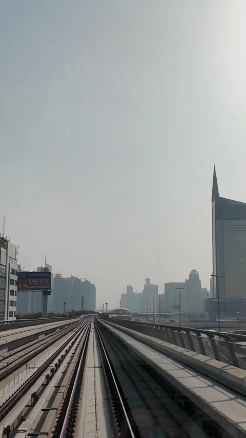 DUBAI, UAE - MAY 12, 2026: POV front view from a moving Dubai Metro train o.. Stock Footage 334715296