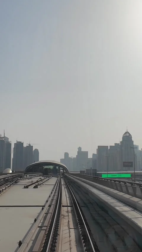 DUBAI, UAE - MAY 12, 2026: POV front view from a moving Dubai Metro train o.. Stock Footage 334715528