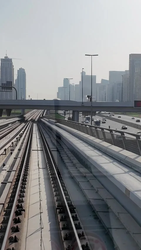 DUBAI, UAE - MAY 12, 2026: POV front view from a moving Dubai Metro train o.. Stock Footage 334715581