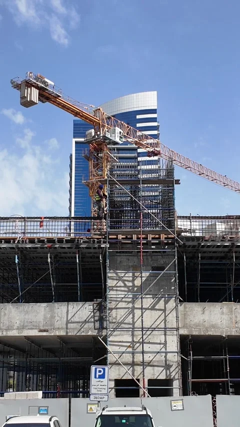 DUBAI, UAE - MAY 13, 2026: Construction site with crane and materials. Stock Footage 334767811