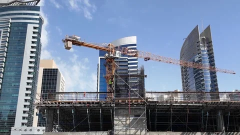 DUBAI, UAE - MAY 13, 2026: Construction site with crane and materials. Stock Footage 334767817