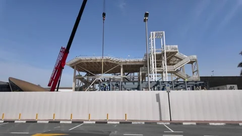 DUBAI, UAE - MAY 13, 2026: Construction site with crane and materials. Stock Footage 334767824