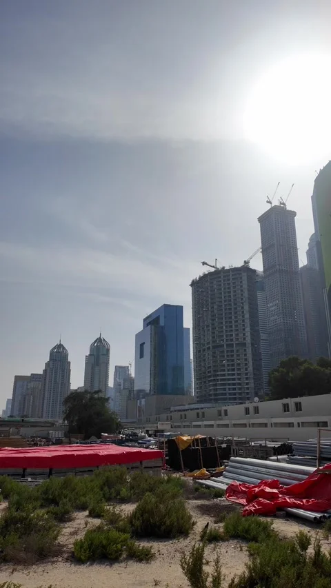 DUBAI, UAE - MAY 13, 2026: Construction site with crane and materials. Stock Footage 334767865